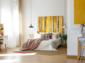 Bedroom with yellow & gold accents